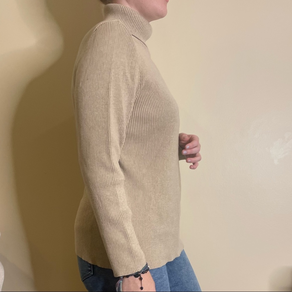 Cream colored, long sleeve turtleneck